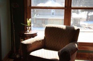 Big cozy arm chair in the sun
