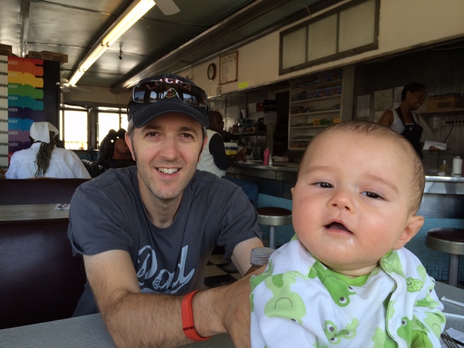 Dad and baby in a diner