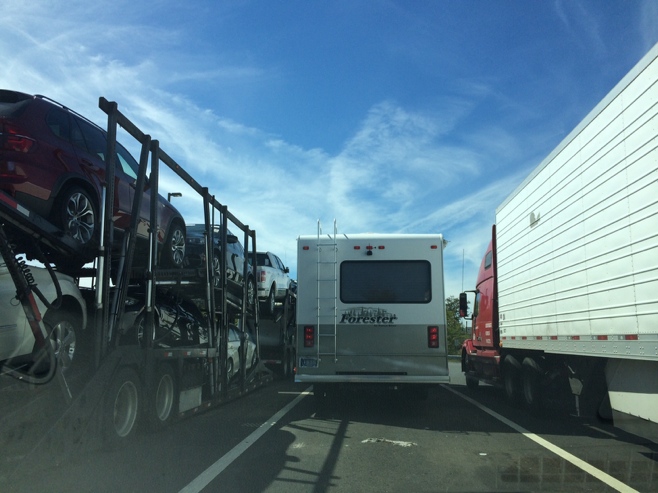 RV between two trucks