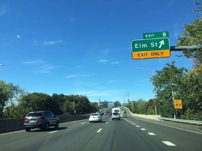 RV passing elm st sign