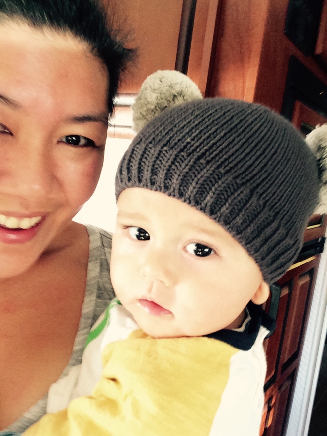 Mum and baby in Pom Pom hat
