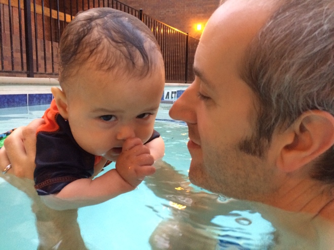 Baby and dad in the pool