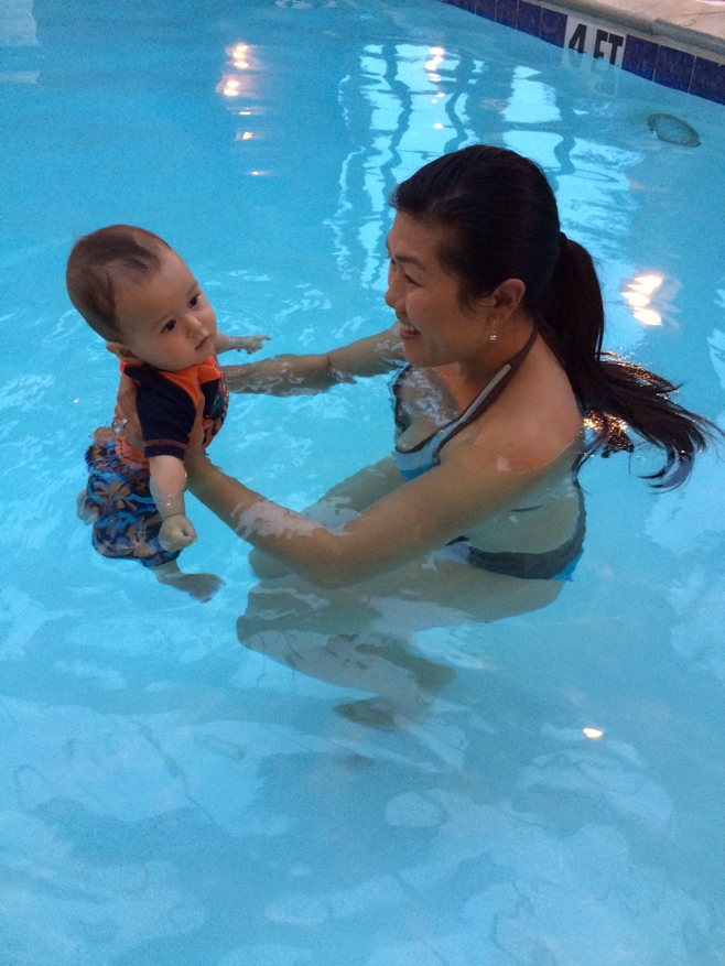 Mum and baby in a pool