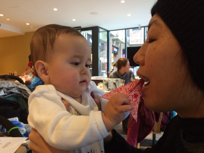 Baby feeding Aunty an oragami star
