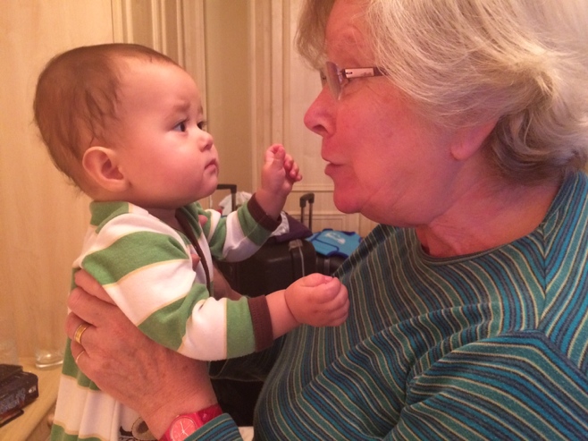 Baby and grandma having serious chat