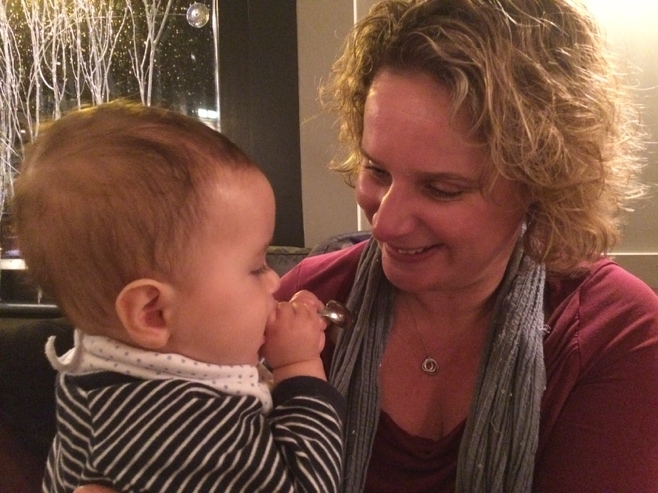 Baby with woman at restaurant