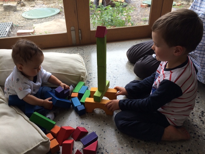 Boys playing with building blocks