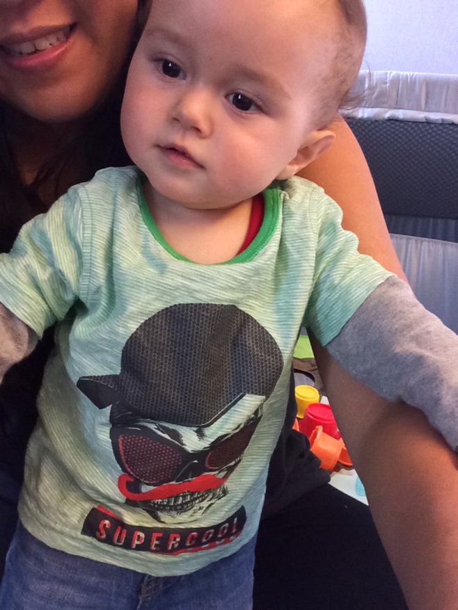Baby wearing a supercool tshirt