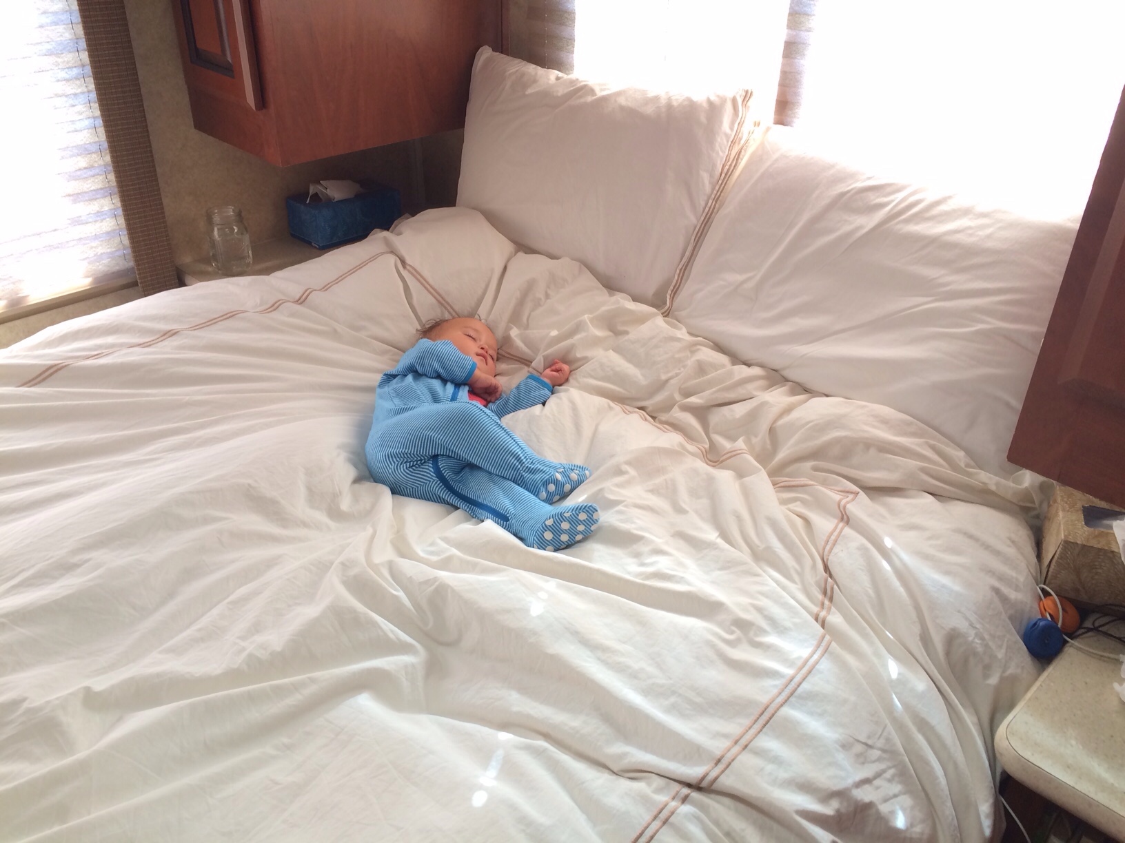 Baby boy o tiny on bed