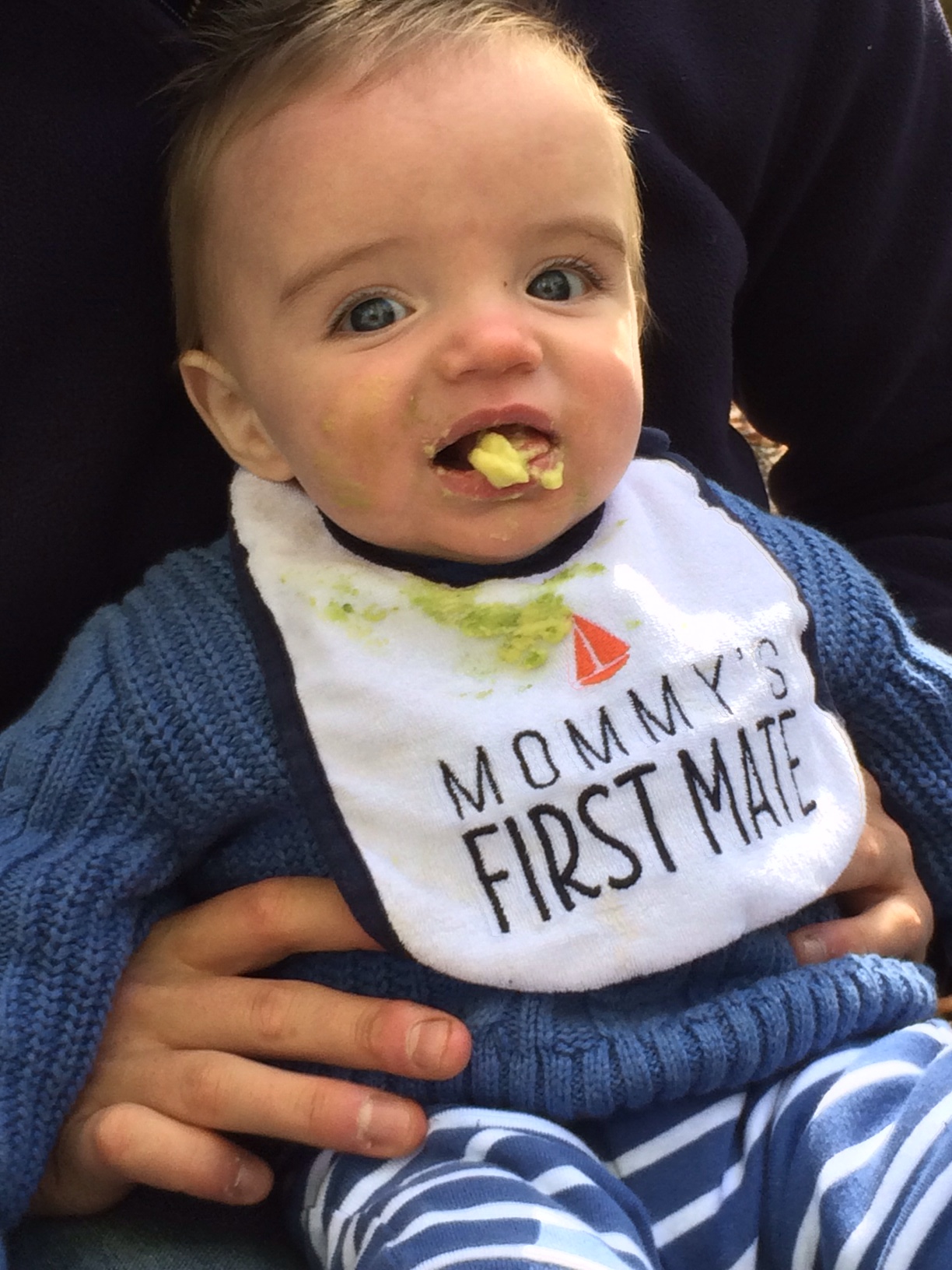 Baby boy h eating avocado 