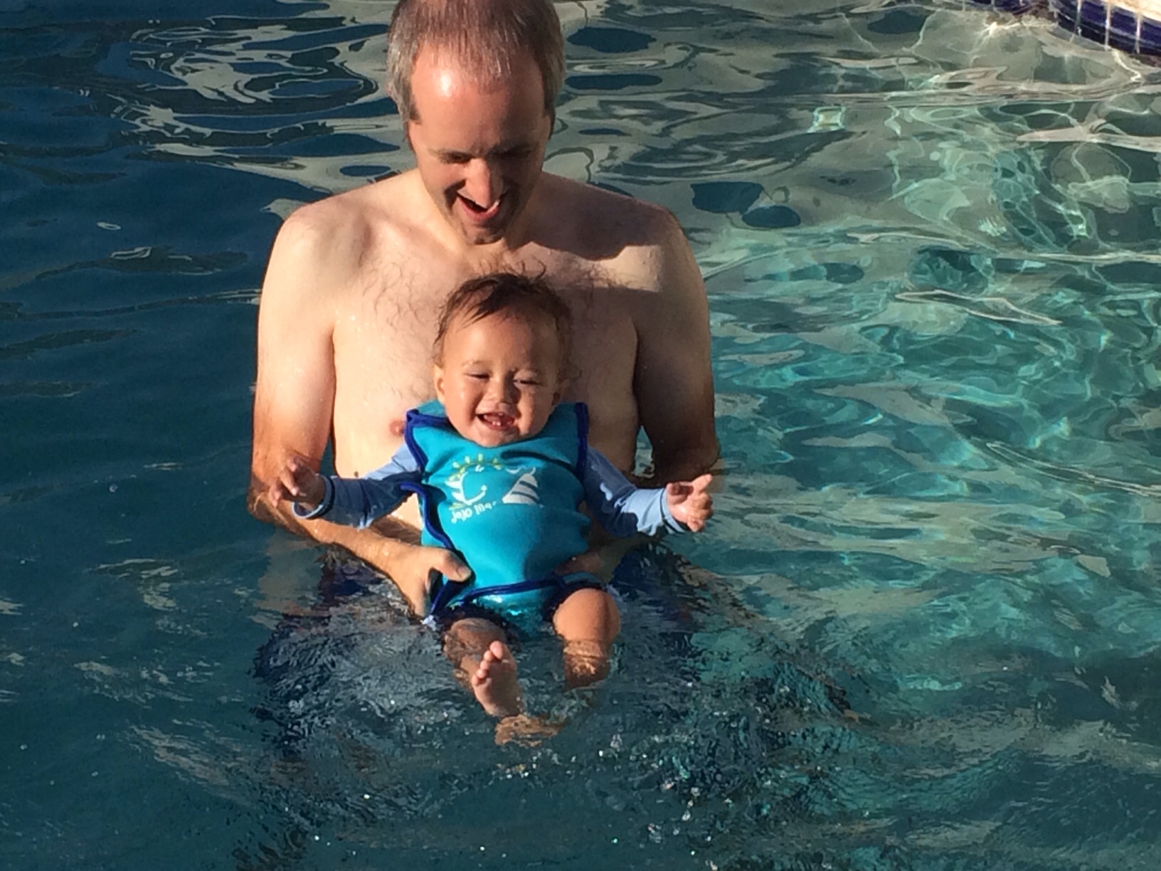 English hubby and baby boy o in Scottsdale pool